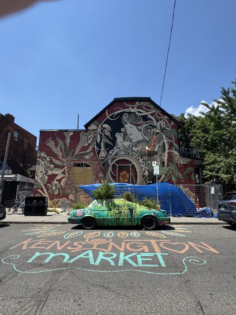 Graffiti art and chalk art that says Kensington market