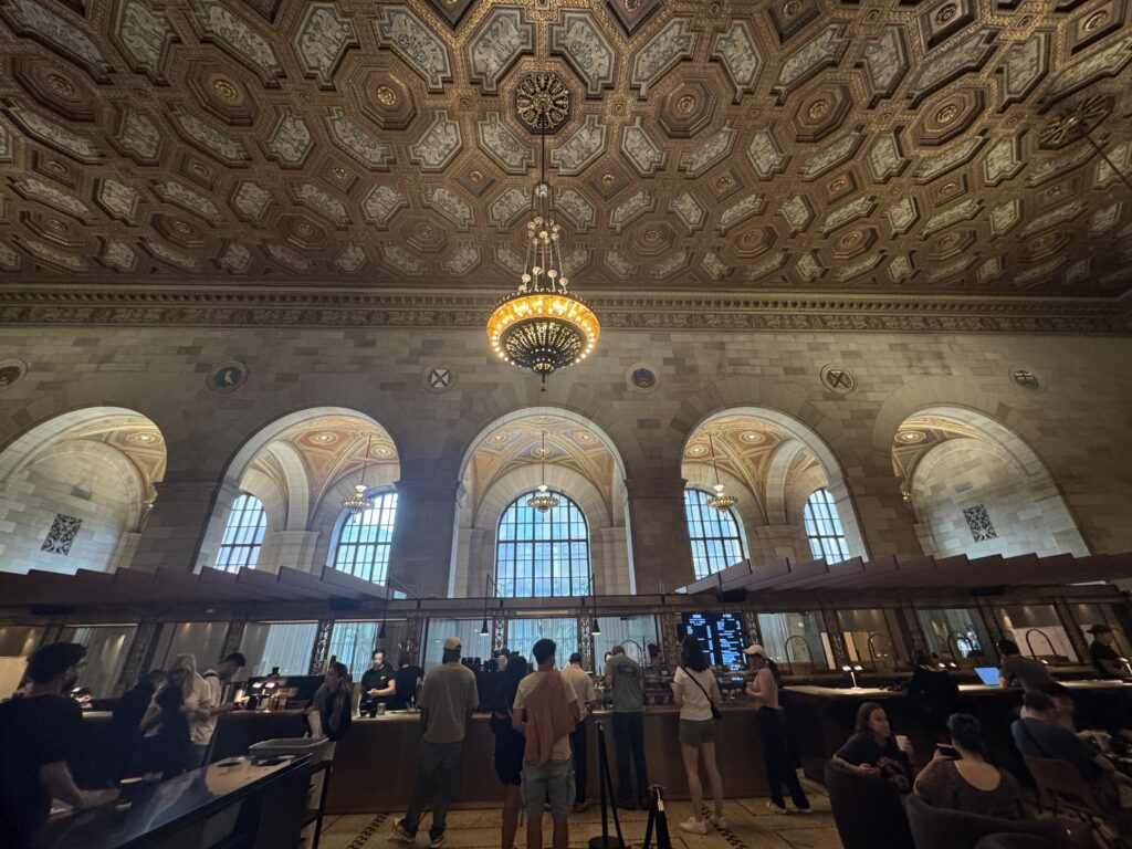 bulding with arches and people in line